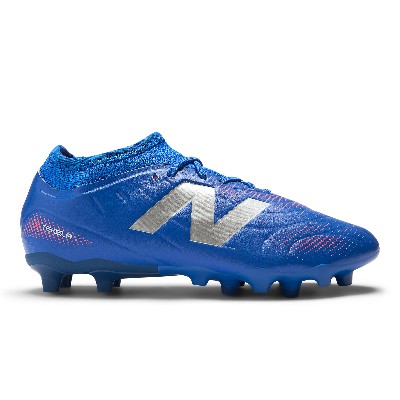 Korki dziecięce New Balance TEKELA TEAM LOW JNR FG V5 SJT3FMP5