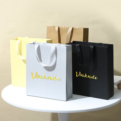 Torba papierowa grubego kartonu nadrukiem własnego logo rączką wstążki na prezenty ślubne urodzinowe słodycze biżuterię perfumy